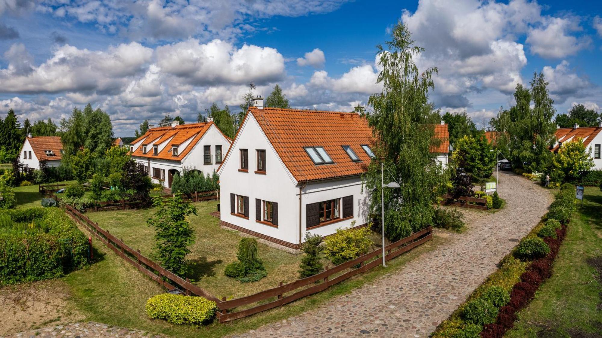 Domy Nad Jeziorem Sun & Snow Osada Zamkowa Pasym Buitenkant foto